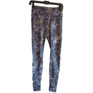 Lululemon leggings. Unsure of size, see measurements. Beautiful print!!
